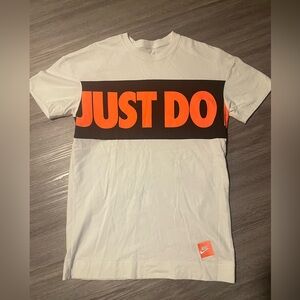 Nike Men's White Thick Tee with Bold Orange Graphic